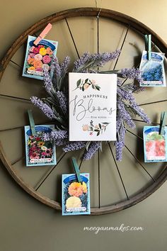 a wheel with flowers and pictures on it that says diy spring vintage bicycle rim wreath