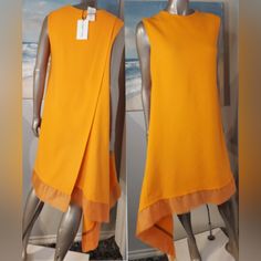 $1,790 New Oscar De La Renta Orange Asymmetric Wool Dress Us 6 Just Stunning. New With Price Tag $1,790.00 From Oscar De La Renta Recent Pre Fall Collection Day Dress Colorway: Orange Retail $1,790.00 Beautiful Orange Wool Daydress With Asymmetric Design. See Pictures For The Beautiful Detail. New Witt Tag - $1,799.00 Us Size 6: Please Go By Measurement Bust 38-39" Plus Strech Waist 42" Hips 50" Lenght 52" At The Longest Point ***** B C 1189 Modern Asymmetrical Dress For Spring Formal, Chic Silk Dress With Overlay, Elegant Asymmetrical Dress With Overlay, Elegant Asymmetrical Overlay Dresses, Asymmetrical Silk Mini Dress, Silk Dresses With Asymmetrical Hem, Modern Asymmetrical Dress For Formal Summer Events, Modern Knee-length Asymmetrical Dress For Formal Occasions, Modern Asymmetrical Dress For Work