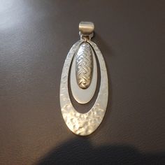 large Mexico oval sterling silver pendant signed   excellent vintage condition not sure on maker  see pics any help would be appreciated Cheap Oval Sterling Silver Necklaces, Silver Oval Pendant Jewelry, Oval Silver Necklace With Large Pendant, Collectible Silver Oval Pendant Jewelry, Vintage Sterling Silver Oval Pendant Necklace, Unique Nickel-free Oval Pendant Necklace, Nickel-free Sterling Silver Oval Pendant Necklace, Nickel-free Sterling Silver Oval Pendant Jewelry, Vintage Copper