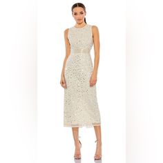 Description Mac Duggal Hand Embellished Mesh Overlay; 100% Polyester Lining Fully Lined Through Body Jewel Neckline Sleeveless Beaded Waist Detail Allover Geometric Pattern Composed Of Hand-Stitched Sequins And Beading Concealed Back Zipper Approx. 48" From Top Of Shoulder To Bottom Hem Available In Nude Silver Style #93758 Sleeveless Embellished Midi Dress For Wedding, Formal Sleeveless Sequin Midi Dress, Sleeveless Embellished Midi Dress For Summer, Sleeveless Sequin Midi Dress For Spring, Sleeveless Embellished Midi Dress For Formal Occasions, Formal Embellished Sleeveless Midi Dress, Sleeveless White Sequined Midi Dress, Spring Evening Embellished Sleeveless Dress, Chic Sleeveless Embellished Midi Dress