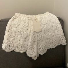 White Crochet Shorts By Lara. Size Medium. Nwt White Crochet Trim Vacation Bottoms, White Crochet Trim Bottoms For Vacation, White Bohemian Shorts With Crochet Trim, Crochet Shorts For Spring Vacation, Crochet Shorts For Vacation In Spring, White Cotton Shorts With Crochet Trim, White Crochet Beach Bottoms, White Crochet Bottoms For Beach, White Crochet Trim Bottoms For Beach Season