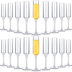 six champagne glasses filled with different types of wine and one has a yellow liquid in the middle