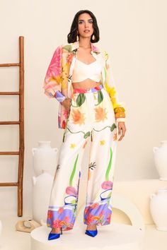 Multi-color shirt featuring floral print all over with cuff sleeves. Paired with a co-ordinating pant and a bralette. - Aza Fashions Floral Print Long Sleeve Sets For Spring, Spring Sets With Floral Print And Long Sleeves, Multicolor Floral Print Bottoms For Brunch, Spring Brunch Sets With Floral Print, Floral Print Sets For Spring Daywear, Multicolor Spring Sets For Daywear, Casual Multicolor Floral Print Sets, Spring Workwear Set With Floral Print, Summer Floral Print Pants For Daywear