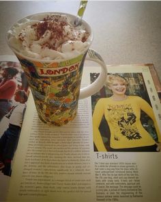 an ice cream sundae in a coffee cup on top of a magazine with the caption london t - shirts