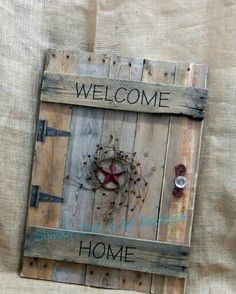 a wooden sign that says welcome home on it