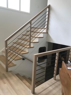 the stairs are made of wood and metal