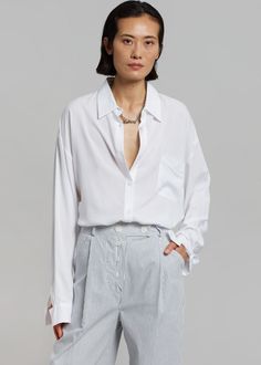 Color: White StripeLightweight cotton twillHigh rise waistWide leg cutTapered styleSingle pleat detailing Hip slant pocketsBack patch pocketsExposed front button closure100% CottonDry CleanImported Wide Pants, Back Patch, Cotton Twill, White Stripe, Wide Leg, Color White, Pants, Women's Top, How To Wear