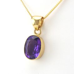 Alchemía Amethyst Oval Pendant Purple Oval Spiritual Jewelry, Spiritual Oval Purple Jewelry, Spiritual Purple Oval Jewelry, Oval Purple Amethyst Gemstones, Gold Oval Gemstones With Large Stone, Oval Purple Gemstones For Gifts, Gold Amethyst Oval Cabochon Jewelry, Oval Pendant, Amethyst Gemstone