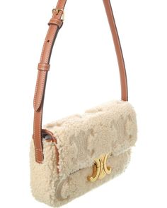 About The Brand: Classic, Coveted Parisian Chic. Made In Italy Claude Shearling Shoulder Bag In Beige Shearling And Leather And Gold-Tone Hardware With Logo Accent Interior Design Details: Leather Interior, Wall Pocket Measures 8In Wide X 5In High X 2In Deep Adjustable Shoulder Strap Drops 10In Fold-Over Flap With Magnetic Closure Please Note: All Measurements Were Taken By Hand And Are Approximate; Slight Variations May Occur. Our Products Are 100% Genuine. In Some Cases We Purchase Merchandise Interior Design Details, Brand Owner, Balenciaga Designer, Parisian Chic, Interior Wall, Wall Pockets, Leather Interior, Magnetic Closure, Luxury Bags