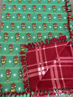 Great for any Christmas Grinch lover. Has a red and white plaid pattern on the back. Handmade fleece tie blanket that is very soft to cozy up with  67in by 51in Christmas Fleece Tie Blanket, Christmas Fleece Blanket, Christmas Blankets Diy, Diy Christmas Blanket, Tie Blanket Ideas For Boyfriend, Christmas Tie Blankets, Grinch Blankets, Tie Blanket Ideas, Christmas Present Exchange