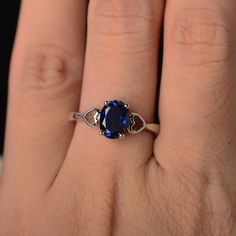 This is a gorgeous handmade creation. Its beauty is its simplicity & Elegance. The 6*8mm oval shape faceted lab sapphire is crafted in solid sterling silver and with rhodium plated. All item is sent in a beautiful gift box If you have any idea of design your ring,pls contact me directly. You can realize more lovely stuff clicking the link https://www.etsy.com/shop/knightjewelry?refshopsection_shophome_leftnav Please leave the correct address and you phone number for delivering successfully. Oval Sapphire Promise Ring, Oval Sapphire Solitaire Birthstone Ring, Oval Solitaire Sapphire Ring With Cubic Zirconia, Ethical Oval Sapphire Gift Ring, Oval Lab-created Sapphire Ring, Silver Oval Sapphire Birthstone Ring, Oval Sapphire Birthstone Ring In Cubic Zirconia, Oval Cubic Zirconia Sapphire Ring Gift, Silver Oval Sapphire Ring