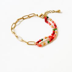 A unique combination of a matte gold-plated paperclip chain and colorful beads,  the bracelet measures 6.5" with a 1" extension. The tiny 3mm faceted glass beads are Czech glass, and the bracelet is adjustable and fun! The details: 3mm Czech glass beads 24K Matte gold chain Shipped in a gift box. Handmade in our Burlington VT studio. Tiny Bead Bracelet, Bracelet With Beads, Paperclip Bracelet, Burlington Vermont, Burlington Vt, Gold Chain Bracelet, Box Handmade, Trombone, Gold Bracelet Chain