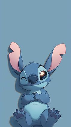 an image of stitchy sitting down with her eyes wide open and ears up,