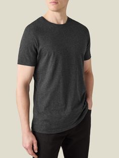 Our most sophisticated T-Shirt is meticulously crafted from an exclusive cashmere-cotton blend sourced from a prestigious mill in Lombardia, Italy. The combination of 85% extra-long cotton and 15% cashmere embodies the finest qualities of both natural fibres. Indulge in the softness and warmth of cashmere while revelling in the comfort and breathability of cotton. The unique mélange yarn imparts a distinctive three-dimensional effect, resulting in an opulent finish.    Designed as a versatile pi Charcoal Blue, Elegant Drapes, Natural Fibres, Cashmere Wool, Casual Elegance, Cotton Silk, Charcoal Grey, Extra Long, Cotton Linen