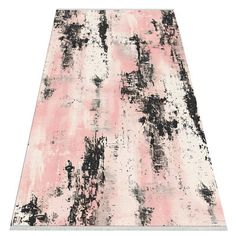 a pink and black area rug on a white background