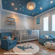 a baby's room decorated in blue and white with stars painted on the ceiling