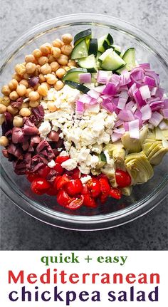 a bowl filled with chopped vegetables and chickpea salad on top of a table