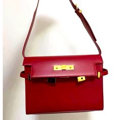 Ysl Manhattan Bag, Medium. In A Gorgeous Red Color With Gold Hardware. This Bag Has Never Been Used And Comes In The Bag. Ysl Manhattan Bag, Ysl Manhattan, Bags Ysl, Saint Laurent Bags, Yves Saint Laurent Bags, In The Bag, Medium Bags, Gold Hardware, Red Color