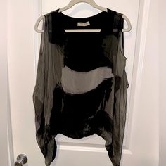 Italian Silk Blouse! Brand New Never Worn. Lined As A Tank Top And See Through Silk Lining Over It With Flutter Sleeves And Open Shoulders. Black And Gray Design, Bunched At The Bottom. One Size Product, But Generally Fits Xs-L Sizes. Flowy Black Top For Layering, Gray Tops For Spring Evening, Gray Tops For Evening In Spring, Black Spring Tops With Overlay, Black Top With Overlay For Spring, Black Flowy Tops For Workwear, Flowy Black Tops For Workwear, Flowy Black Tops For Work, Chic Gray Evening Tops