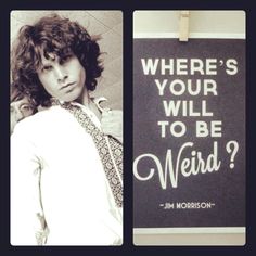 a man with curly hair wearing a tie next to a sign that says where's your will to be weird?