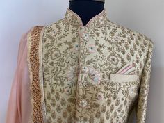 Raw silk Sherwani with all over thread work.it gives you a elegant look. It comes with stole. Colour options available. Includes- sherwani and bottom Additional accessories like mojdi and Pagdi will be charged etc. Anarkali Sherwani With Resham Embroidery In Dola Silk, Traditional Drape Sherwani With Dabka Work In Dola Silk, Designer Dola Silk Sherwani With Traditional Drape, Bollywood Style Embroidered Dola Silk Sherwani, Bollywood Style Dola Silk Sherwani With Zari Work, Anarkali Style Raw Silk Sherwani With Zari Work, Anarkali Style Sherwani With Resham Embroidery In Art Silk, Anarkali Style Sherwani With Zari Work, Unstitched Dola Silk Sherwani With Resham Embroidery