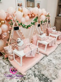 pink and gold party decorations with balloons