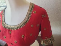 "Vermilion red Saree blouse in the softest Maheshwari silk cotton fabric and luxurious embroidery.   Gorgeous combination of bright red and bottle green with exclusive golden hand embroidery, antique flat sequins and pitta zardosi, antique badla work royal silver and golden peacocks on the sleeves, elegant neckline, floral booties that sparkle and make this an apt choice for any special occasion, be it is for a festival, wedding, or any party.  Pot neck style with high neck, back hooks, royal elegance  Size: 40\"  (Size can be downsized or upsized for additional alteration charge) Very elegant and much more gorgeous in person than in pictures!" Festive Chinon Blouse With Intricate Embroidery, Red Saree Blouse With Zari Work, Festive Green Chinon Blouse, Festive Transitional Chinon Blouse, Designer Red Blouse With Cutdana, Festive Chinon Blouse With Pallu, Traditional Green Chinon Blouse, Red Dola Silk Blouse With Zari Work, Red Chanderi Blouse Piece With Intricate Embroidery