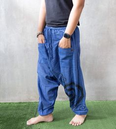 "The harem style trousers made from cotton fabric 100%with an elasticated smock waist and ankles they provide a comfortable lightweight fit, perfect for casual wear, festivals, yoga, holidays as well as pairing with a plain top to get that popular look. Materials: Cotton Sizing: One size fits most. Size : (inches) ✿Waist 24\" (61 cm) stretching to 46\" (elastic material) (116 cm) ✿ Hip 30\"- 48\" ( 76-121 cm ) ✿ Length 40\" ( 101 cm ) ✿ Length around each legs: 10\" (25 cm) can be stretch (elast Cotton Harem Parachute Pants With Pockets, Blue Cotton Harem Pants With Pockets, Casual Cotton Harem Cargo Pants, Blue Cotton Harem Pants With Side Pockets, Blue Cotton Harem Pants Loosely Fitted At Hips, Blue Cotton Harem Pants For Festival, Traditional Cotton Parachute Pants With Pockets, Traditional Baggy Cotton Bottoms, Hippie Outfits Men