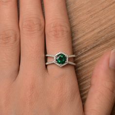 It is a lab emerald ring. The main stone is 7mm*7mm round cut, weight about 1.3 carats. The basic metal is sterling silver and plated with rhodium. To change the metal to a solid gold (white/rose) or platinum is also available, please ask for a quotation if you want. You can also go to my shop Home for more elegant rings: https://www.etsy.com/shop/godjewelry?ref=hdr_shop_menu More lab emerald rings: https://www.etsy.com/shop/godjewelry?ref=seller-platform-mcnav&section_id=20709240 Customizat Silver Engagement Rings Round, Elegant Rings, Emerald Halo, May Birthstone Rings, Emerald Rings, May Birthstone, Elegant Ring, Green Gemstones, 3 Carat