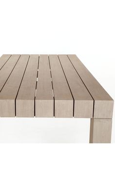 a table made out of wooden planks on a white background with no people around it