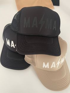 Who doesn't love a good neutral trucker?  We've added the puff material to give this one a fun texture.  Tan or black with white design  Otto brand OSFM Mama Trucker Hat, Hat Designs Vinyl, Trucker Hat Designs Ideas, Mama Hats, Lexi Jade, Foam Hats, Trucker Hat Designs, Trendy Trucker Hats, Momma Shirts