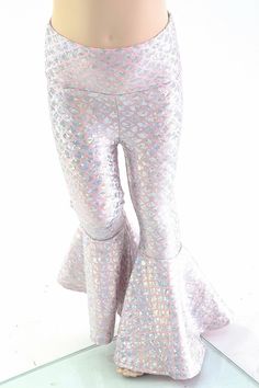 This item is made to order, please read all the way through the listing before purchasing! These leggings are made of top quality metallic lycra spandex, in a gorgeous baby pink & silver mermaid scale pattern. They have a smooth folded waistband for a comfortable and stretchy fit. They flare out super wide below the knee, giving you all the flare of mermaid fins combined with the convenience of leggings! KIDS SIZE CHART is available here: https://coquetryclothing.com/pages/size-chart We real Mermaid Fins, Mermaid Pants, Mermaid High, Mermaid Fin, Silver Mermaid, Scale Pattern, Size Chart For Kids, Dragon Scale, Mermaid Scales