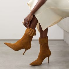 Elevate your style with these chic and versatile boots that effortlessly blend sophistication and trendiness. Crafted with high-quality suede material, they offer a luxurious feel and durability. The pointed-toe design adds a touch of elegance, while the stiletto heels provide a flattering lift. Perfect for any occasion, these ankle boots can be dressed up or down, making them a go-to choice for both casual outings and formal events. Step out in confidence and make a fashionable statement with t Red Carpet Party, Cowboy Shoes, Dance Heels, Yellow Heels, Shoes Boots Ankle, Suede Boots Knee High, Heel Ankle Boots, Brown Heels, Brown Ankle Boots