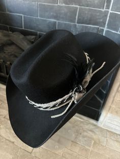 Women's cowboy hat  Boots not included  Decorative wool cowboy hat.  Geo quarts charm attached One size fits most  56-58  Adorable   All sales final. Birthday girl, bride to be, bachelorette fun.  Need a different color ? Message me. Wool black hat. silvers, black white, gray, black feather Western Style Black Top Hat For Western-themed Events, Western Black Hat For Western-themed Events, Western Style Black Hat For Western-themed Events, Black Western Top Hat For Rodeo, Black Western Top Hat For Ranch, Black Western Style Top Hat For Ranch, Country Style Black Top Hat For Ranch, Western Black Felt Hat For Ranch, Western Black Felt Hat For Western-themed Events