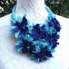 Bohemian Blue Jewelry With Handmade Flowers, Blue Flower-shaped Bohemian Necklace, Blue Bohemian Flower Necklace, Bohemian Blue Flower Necklace, Turquoise Flower Jewelry For Party, Blue Flower Decorated Jewelry For Wedding, Blue Flower Decorated Wedding Jewelry, Blue Wedding Jewelry With Flower Decoration, Blue Flower Wedding Jewelry