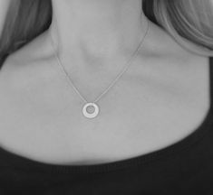 "This small sterling silver washer pendant looks great on its own or layered with other necklaces. It has been hammered to create a modern design. It hangs on a sterling silver extendable link chain 18-20\"/45-50cm Pendant size: 1.4 cm (0.5\") in diameter. The necklace will come in a beautiful gift box." Minimalist Sterling Silver Round Pendant Jewelry, Minimalist Round Pendant Sterling Silver Jewelry, Minimalist Nickel-free Sterling Silver Necklace, Modern Hypoallergenic Sterling Silver Necklace, Hypoallergenic Modern Sterling Silver Necklace, Simple Design Sterling Silver Necklace, Minimalist Hypoallergenic Sterling Silver Necklaces, Silver Open Circle Hammered Jewelry, Sterling Silver Circle Jewelry With Simple Design