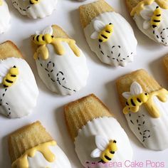 there are many decorated cookies with bees on them in the shape of sheeps and pigs