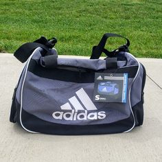 Adidas Defense Small Duffel Bag In Onx Black Which Is Grey, Black & White With 2 Zippered Outside Pockets 1 Is Ventilated With Mesh, 2 Padded Handles & A Removable Shoulder Strap. 19" X 11 X 11 Brand New With Tags No Flaws I Offers Add Another Item From My Closet To A Bundle For Discount I Ship Next Day #1752 Us Adidas Bags, White Brand, Brand Colors, Duffel Bag, Black Adidas, Adidas Men, Defense, Black Gray, Black And Grey