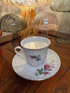 a coffee cup sitting on top of a saucer