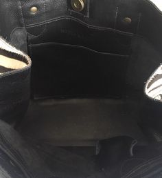 "It is a pre owned MITZI BAKER bag and shows signs of wear. The exterior does come with scuffing at the edges and some surface scratches from normal used., no major flaws. The inside looks clean and undamaged. The hardware is functional. This bag is in good overall used condition. Bag length 12\" Bag height 9.5\" Bag depth 3.5\" Strap drop 7.5\" Please view the photos to evaluate the condition. Any questions regarding an item, ask prior to making your purchase. All sales are final. No refund wil Black Leather Bucket Satchel, Black Textured Leather Satchel For Errands, Leather Shoulder Bag With Snap Closure For Errands, Leather Satchel With Snap Closure For Daily Use, Black Leather Shoulder Bag With Snap Closure, Black Shoulder Bag With Leather Lining For Errands, Leather Satchel With Snap Closure For Errands, Leather Bag With Snap Closure For Errands, Vintage Black Bucket Shoulder Bag