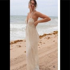 Love Stitch Rope Lace Backless Maxi Dress In Natural/ Beige Color. Rope Lace Backless Maxi Dress, Twist Rope Lace Detail On Shoulder Strings And Back Braided Accents Empire Waist Plunging V Neckline Soft Underskirt. Beach Season Backless Maxi Dress For Date Night, Backless Maxi Dress For Date Night And Beach Season, Elegant Vacation Dress With Lace Back, Elegant Lace Back Vacation Dress, Elegant Lace Back Dress For Vacation, Chic Lace Maxi Dress For Beach Cover-up, Elegant Lace Maxi Dress Beach Cover-up, Elegant Backless Maxi Dress Beach Cover-up, Elegant Lace Maxi Dress For Beach Cover-up