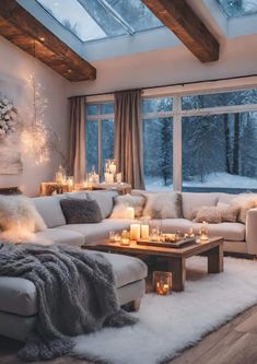 a living room filled with lots of furniture next to a large window covered in snow