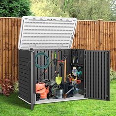 an outdoor storage shed with tools in it