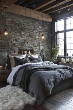 a bedroom with stone walls and flooring has a large bed in front of the window