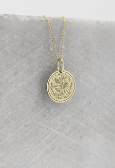 14K Real Solid Gold Necklace, Hallmarked on the back of your pendant for certification! Scottish Thistle Necklace - Engraved Scottish Thistle Charm - Gold Graduation Charm - Gold Scottish Thistle Pendant ▪️ A beautiful and clean engraved Scottish Thistle pendant made out of 14K Solid Real Gold. Available only in yellow gold! Pendant Thickness: 0.50mm Jump Ring inner diameter: 4mm Dimensions: - 13mm / 0.52 inches - 15mm / 0.59 inches - 18mm / 0.70 inches - 20mm / 0.78 inches - 22mm / 0.86 inches Vintage Gold Medallion Necklace In Sterling Silver, Heirloom Style Sterling Silver Medallion Necklace, Heirloom Sterling Silver Medallion Necklace, Engraved 14k Gold Amulet Medallion Necklace, Engraved Yellow Gold Medallion Necklace In Sterling Silver, Engraved Yellow Gold Sterling Silver Medallion Necklace, Classic Engraved Round Pendant Necklaces, Gold Necklace With Flower Charm On Oval Pendant, 14k Gold Engraved Medallion Pendant Necklace