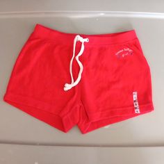 Elastic Waist Casual Tommy Hilfiger Short Bottoms, Tommy Hilfiger Casual Short Length Bottoms, Red Cotton Sporty Bottoms, Sporty Red Shorts For Loungewear, Sporty Red Cotton Shorts, Sporty Tommy Hilfiger Short Bottoms, Tommy Hilfiger Sporty Shorts, Red Cotton Shorts For Loungewear, Red Cotton Shorts For Playwear