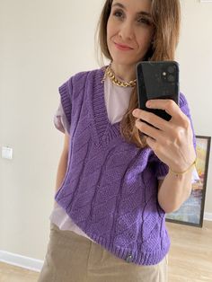 Hand-Knit Purple Vest - Soft and Stylish 💜 Elevate your wardrobe with this beautifully hand-knit purple vest, crafted from soft, high-quality yarn for a cozy yet lightweight feel. Its timeless design makes it perfect for layering over your favorite tops, dresses, or blouses. Luxuriously soft yarn that feels gentle against the skin. A rich, elegant purple that complements any style. Comfortable and versatile, perfect for everyday wear or special occasions. Hand-knit with care and attention to de Winter Knit V-neck Sweater Vest, Cozy Cable Knit Sleeveless Sweater Vest, Winter V-neck Chunky Knit Sweater Vest, Cozy Sleeveless Cable Knit Sweater Vest, Knitted V-neck Vest For Fall, Casual Knitted Sleeveless Sweater Vest, Cozy Knit Sleeveless Sweater Vest, V-neck Knit Sweater Vest For Fall, Hand Knitted V-neck Cardigan