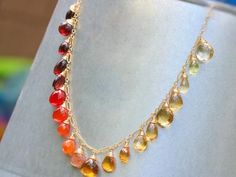 THE JEWELRY IS SHIPPED via DHL EXPRESS (2-5 days delivery door to door). THE DHL SHIPPING COST IS INCLUDED IN THE PRICE.The Sunset Necklace - Multi Gemstone Orange Red Drop Necklace, Semi Precious Colorful Necklace► Measurements / Details:- Necklace Length: Made to Order- Gold: High quality Gold Filled- Silver: High quality Sterling Silver► Gemstones:The necklace includes excellent AAA quality precious gemstones:~ Scapolite~ Lemon Quartz~ Citrine in several shades~ Honey Quartz~ Padparadscha Sap Red Gemstone Drop Jewelry, Red Drop Gemstone Jewelry, Elegant Multicolor Citrine Jewelry, Multicolor Teardrop Jewelry With Gemstone Accents, Multicolor Teardrop Gemstones For Jewelry Making, Teardrop Multicolor Gemstones For Jewelry Making, Red Briolette Gemstone Beads Necklace, Red Briolette Gemstone Beads Jewelry, Amber Drop Gemstone Necklace