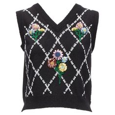 GUCCI black silver diamong argyle floral embellished sweater vest S Reference: AAWC/A00610 Brand: Gucci Designer: Alessandro Michele Material: Viscose, Blend Color: Black, Silver Pattern: Floral Extra Details: Sequins and bead floral embellishment. Metallic silver argyle knit pattern. Gucci Worldwide embroidered logo at back. Made in: Italy CONDITION: Condition: Excellent, this item was pre-owned and is in excellent condition. SIZING Designer size: S Size reference: US2-4 / UK8 / IT40 / FR36 / XS-S MEASUREMENTS: Shoulder to shoulder: 36cm / 14" Chest: 42cm / 16.4" Waist: 40cm / 15.6" Length: 48cm / 18.7" This Gucci item is authentic. Gucci Vest, Worldwide Logo, Floral Embellishment, Embellished Sweater, Jersey Vintage, Gucci Designer, Phoebe Philo, Wool Vest, Alessandro Michele