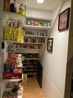 an open pantry with lots of food in it